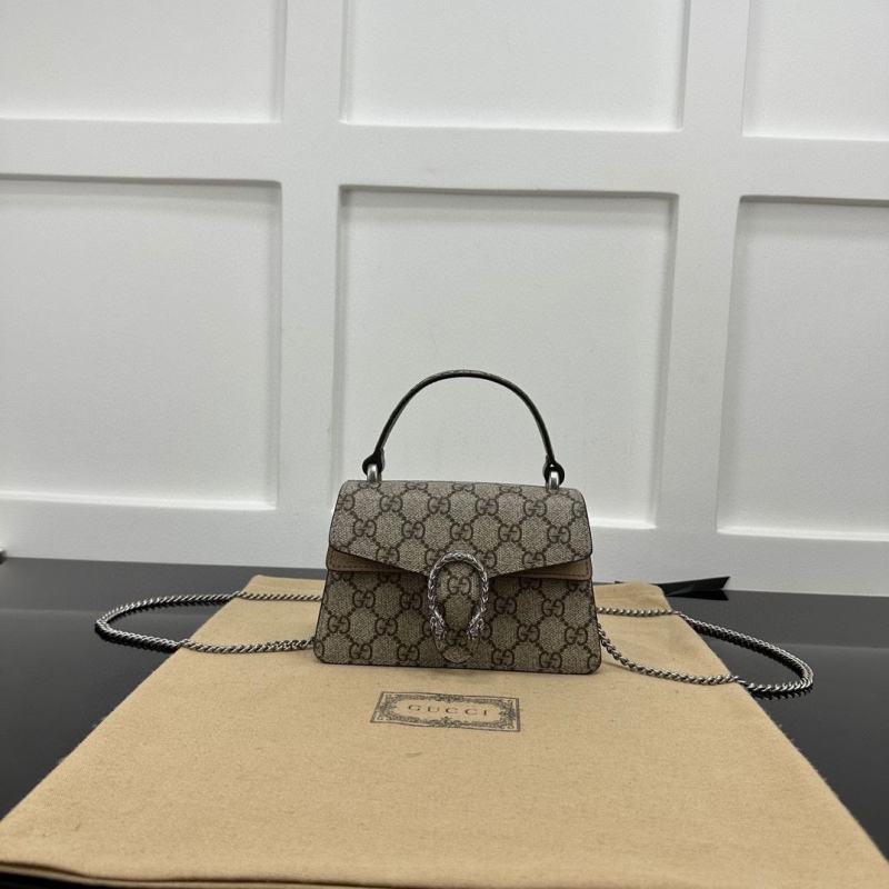 G*u*i top handle bags